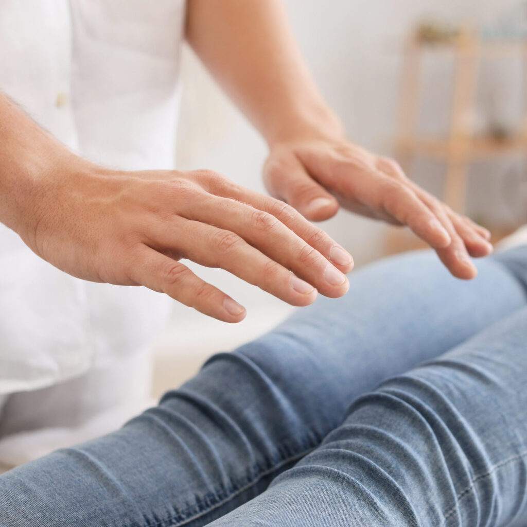 Reiki master working with energy healing